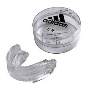 Single transparent mouthguard by ADIDAS. Made of transparent silicone. It is single and thermoformable. Available in Senior size for adults.